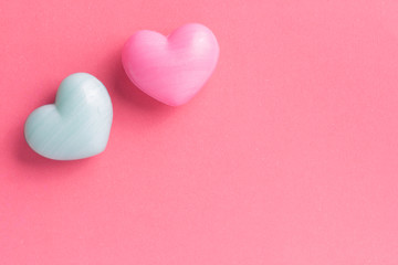 Couple of heart shape over red table. Romantic Valentine Day concept with copy space.
