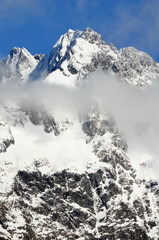 Obraz premium Glacier covered mountain peak, Fiordland National Park, South Island, New Zealand