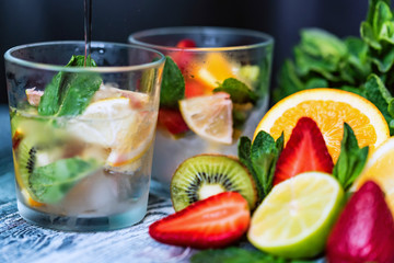 Homemade lemonade with fruit and mint