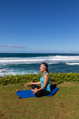 Woman Practicing Maui on the Scenic Maui Coast