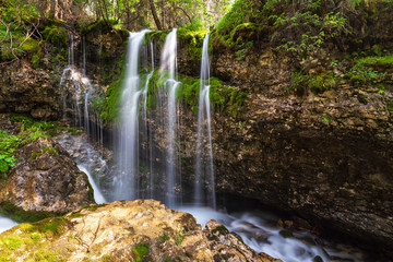 Fototapeta na wymiar small waterfalll in Val di Fassa