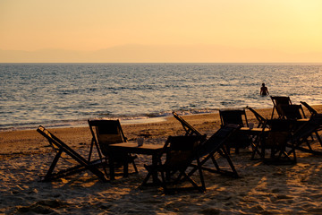 Silhouette in the water at sunset