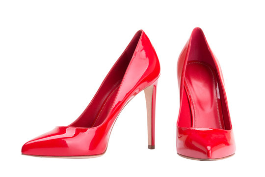 Red female shoes on a white background