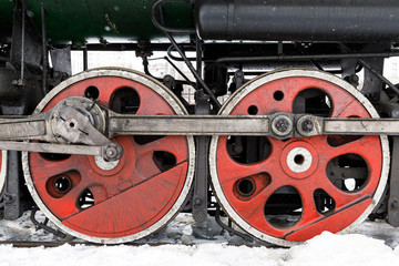 red wheel and detail of mechanism a vintage russian steam train locomotive