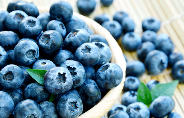 Blueberries in basket with bamboo mat on wooden floor
Blueberries are Low in Calories, But High in Nutrients