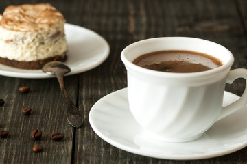 a cup of coffee and tiramisu