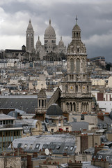 Fototapeta na wymiar Sacre-Coeur above the rooftops of Paris.