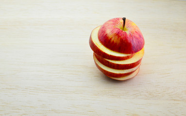 Diet concept with red apples on a wooden table,Fruit diet weight loss