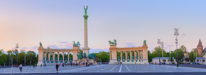 Millennium Monument on the Heroes' Square. Blurred-unrecognizable faces of people. Is one of the...