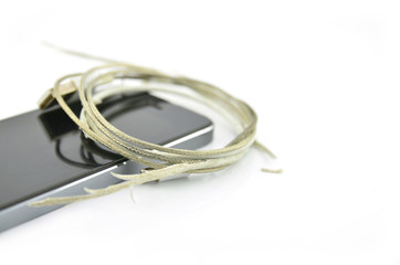Close Up the Broken Smart Phone Charger Cable isolated on white Background.