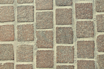 Obraz premium Sidewalk gray tiles. Square paving stones. Background. Texture.