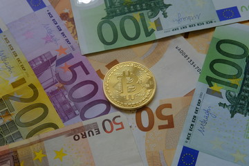 Euro in banknotes and coin bitcoin