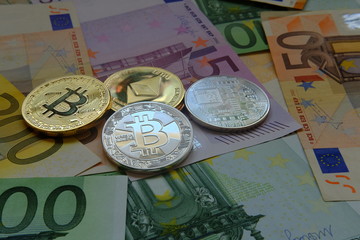 Euro in banknotes and coin bitcoin