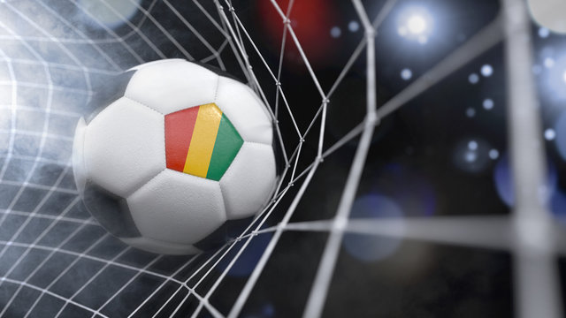 Realistic soccer ball in the net with the flag of Guinea.(series)