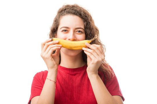 Woman having a banana smile