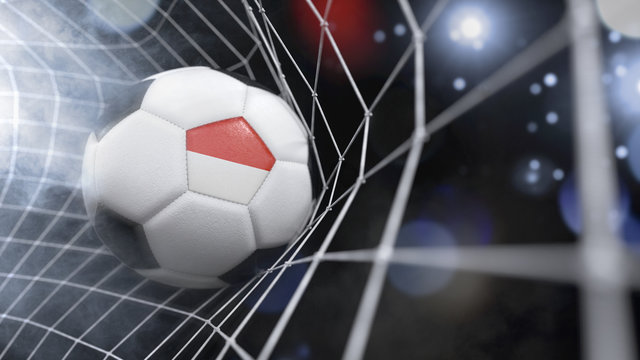 Realistic soccer ball in the net with the flag of Indonesia.(series)