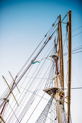 Obraz premium old sailing ship, frigate at anchor in the port