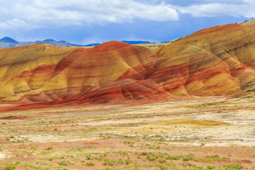 North America, United States, Oregon, Central Oregon, Redmond, Bend, Mitchell. Series of low clay hills striped in colorful bands of minerals, ash and clay deposits.