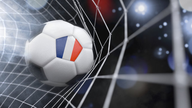 Realistic soccer ball in the net with the flag of New Caledonia.(series)