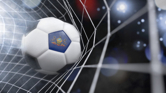 Realistic soccer ball in the net with the flag of Pennsylvania.(series)