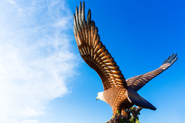 Fototapeta na wymiar Big Eagle Statue on the Eagle square. Background with copyspace.