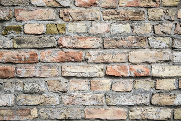 Cracked gray brick wall, blocks in a line background