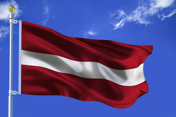The silk waving flag of Latvia with a flagpole on a blue sky background with clouds .3D illustration.