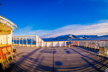 Outdoor view of empy area over the cruise ship in Hurtigruten area, from deck in a gorgeos blue sky and blue water