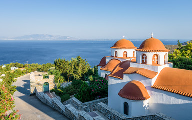 Beautiful mediterranean greek colorful holy monastery Agios Savvas situated on a mountain high...