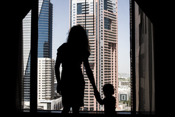 child on a modern city