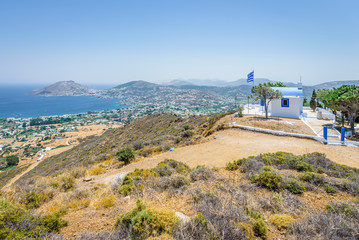 Fototapeta na wymiar Beautiful white blue greek church monastery with amazing views to the sea situated in a small greek village Kantouni of Leros Island, Kos Island, Dodecanese, Greece