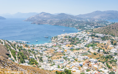 Beautiful sunny village town Panteli harbor view to the greek blue sea water from the old castle...