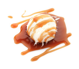 Ball of tasty vanilla ice cream with caramel topping on white background