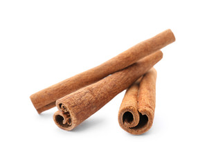 Aromatic cinnamon sticks on white background