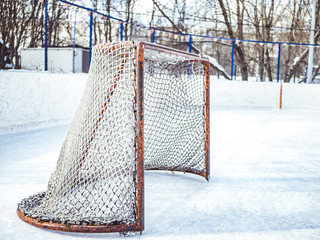 empty hockey gates before the match on a winter sunny day
