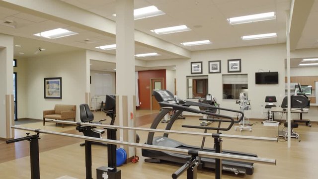 Wide shot of a rehabilitation gym at daytime