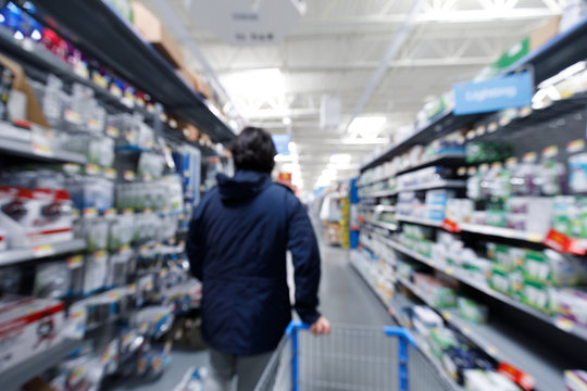 Blurred Mart Shop Store Background With Customer Shopping Interior