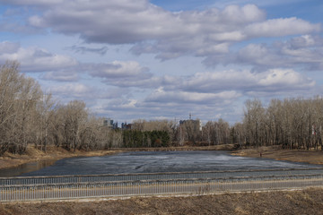 Early spring. Melting river