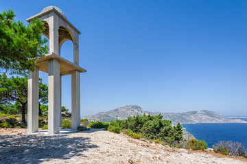 Holy white and blue greek orthodox chruch chapel of agios mamas the holy mother shining at an empty...