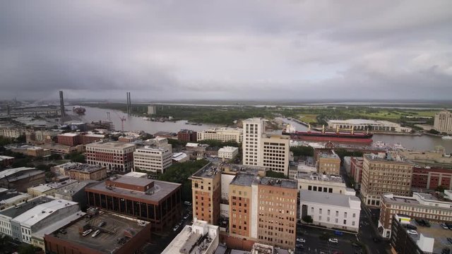 Georgia Savannah Aerial v2 Flying low over historic district, panning around river 10/17