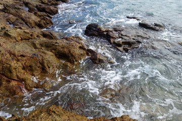 Waves on stone beach