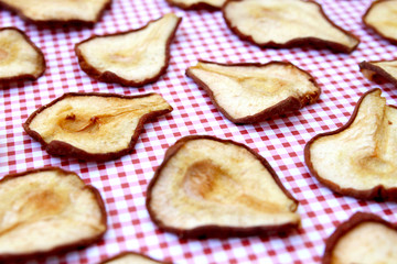 Dried Pears on Red Checked Background