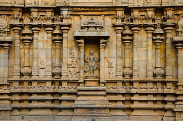Carved pillars and idols on the outer wall of the Brihadishvara Temple, Thanjavur, Tamil Nadu, India