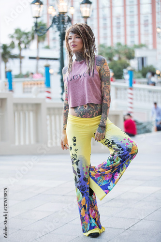 Beautiful Hippie Girl With Tattoos And Dreadlocks