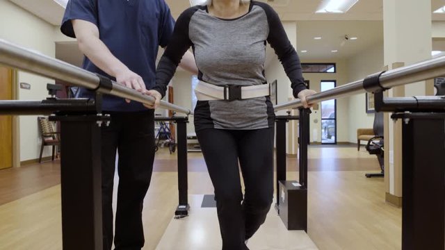 Medium shot of a senior woman doing stability exercise