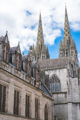 Fototapeta na wymiar Quimper in Brittany, the Saint-Corentin cathedral, medieval street 