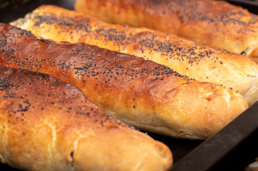 Buns with raisins and jam in a plate