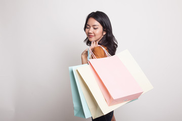 Young Asian woman happy with shopping bag.