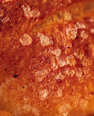 Granules of sugar in a bun as a background