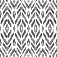 Black and white ikat tribal textile modern pattern. Seamless background. Graphic design for cover, rug, carpet, wallpaper, clothing, wrapping, fabric. Vector illustration.
